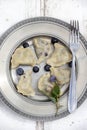 Tasty, homemade dumplings with blueberries - summer dish for kids