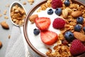 Tasty homemade granola served on grey table. Healthy breakfast Royalty Free Stock Photo