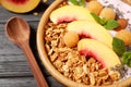 Tasty homemade granola with yogurt on wooden table, closeup. Healthy breakfast Royalty Free Stock Photo