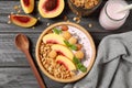 Tasty homemade granola with yogurt on grey wooden table. Healthy breakfast Royalty Free Stock Photo