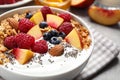 Tasty homemade granola with yogurt on grey table, closeup. Healthy breakfast Royalty Free Stock Photo