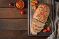 Tasty homemade ground baked turkey meatloaf on wooden table. Royalty Free Stock Photo