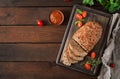 Tasty homemade ground baked turkey meatloaf on wooden table. Royalty Free Stock Photo