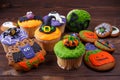 Tasty homemade Halloween sweets with decorations made of confect