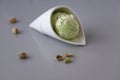 Fresh pistachio ice cream, nuts and mint.