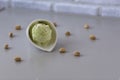 Fresh pistachio ice cream, nuts and mint. Royalty Free Stock Photo