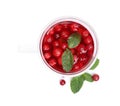 Tasty hot cranberry tea with mint in glass cup on white background, top view Royalty Free Stock Photo