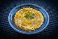 Tasty hummus or houmous in blue bowl Royalty Free Stock Photo