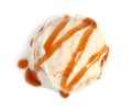 Tasty ice cream ball with caramel sauce