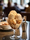 Tasty ice cream in a bowl at restaurant