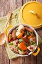 Tasty Irish coddle with pork sausages, bacon and vegetables Royalty Free Stock Photo