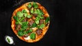 Special italian pizza with beef and baby spinach made from an authentic recipe. Mozzarella topping mealted on top.