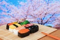 Tasty japan sushi with pink cherry blossoms tree Royalty Free Stock Photo