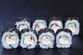 Tasty Japanese food. Sushi rolls with crab meat, cucumber and cr