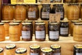 Tasty jars of natural honey for sale at a market stall