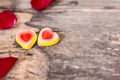 Tasty Jelly candies shaped heart with red Rose petals Royalty Free Stock Photo