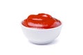 Red tasty ketchup or tomato sauce in bowl isolated on white background Royalty Free Stock Photo