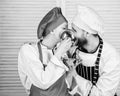 Tasty kiss. Family cooking in kitchen. secret ingredient by recipe. cook uniform. man and woman chef in restaurant