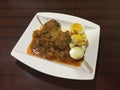 Tasty kofta with eggs in plate