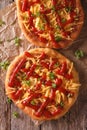 Tasty langos with cheese and ketchup close-up. Vertical top view