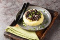 Tasty liver fried served with boiled potatoes close-up in a plate. Horizontal Royalty Free Stock Photo