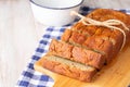 Loaf of Banana Bread With Bowl and Napkin