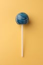 Tasty lollipop on orange background, top view Royalty Free Stock Photo