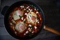 A top-down view of a tasty looking shakshouka