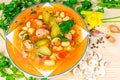 Tasty lunch  . Bean soup sausage, mushrooms, cucumber Royalty Free Stock Photo