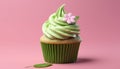Tasty matcha cupcake on pink Royalty Free Stock Photo