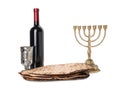 Tasty matzos, wine and menorah on white background. Passover Pesach celebration Royalty Free Stock Photo