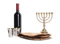 Tasty matzos, wine and menorah on white background. Passover Pesach celebration Royalty Free Stock Photo