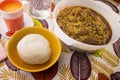 A tasty meal of pounded yam and Nigerian Egusi soup Royalty Free Stock Photo