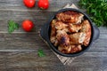 Tasty meat rolls with mushrooms in a ceramic pot on a wooden background. Top view Royalty Free Stock Photo