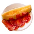 Tasty melon with thin slices of jamon, traditional french dish