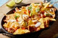 Tasty Mexican chicken au gratin with nachos