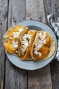 Mexican potato stew tacos with fresh cheese