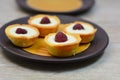 White chocolate and raspberry tarts.