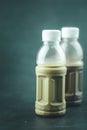 Tasty mocha coffee and cocoa milk in plastic bottle Royalty Free Stock Photo