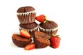 Tasty muffin cakes with strawberries and chocolate, isolated on white Royalty Free Stock Photo