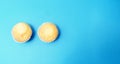 Tasty muffin closeup on a blue paper background Royalty Free Stock Photo