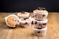 Tasty Muffin Cupcakes with Blueberries on a Wooden Background Pile of Homemade Muffins Horizontal Royalty Free Stock Photo