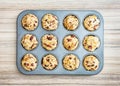 Tasty muffins stuffed with ham and cheese on the tray, food them