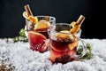 Tasty mulled red wine with orange and cinnamon Royalty Free Stock Photo