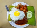 Tasty Nasi Lemak With Egg And Chicken