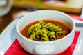 Tasty and nutritious tomato soup with fresh pasta, dietary meal Royalty Free Stock Photo