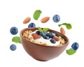 Tasty oatmeal with blueberries, yogurt and almond on background