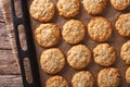 Tasty oatmeal cookies close-up on a baking sheet on the table. h Royalty Free Stock Photo
