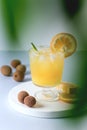 Tasty Orange Juice in Glass With Ice Cube Blue and White Background Fresh Oranges Vertical Royalty Free Stock Photo