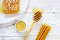 Organic honeycomb, honey lip balm and natural wax candles Royalty Free Stock Photo